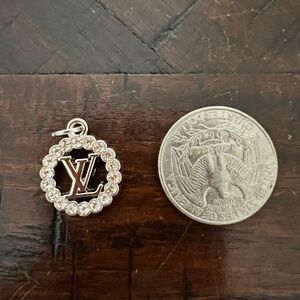 Elegant LV Silver Pendant with Crystal Accents